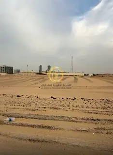 For sale: commercial land in Al Malha area, Sharjah Emirate. Excellent location, corner plot on two