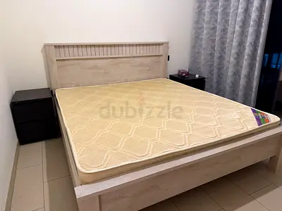 Kind size bed frame with bedside drawer - light wood finish