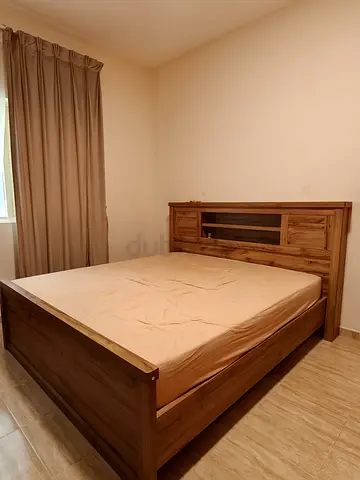 Excellent condition king size bed and mattress, with solid wood dressing table & reclining armchair