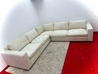 Like new condition pottery barn beige color corner sofa