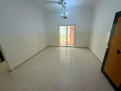 Two-bedroom apartment with a living room for annual rent in Ajman Industrial Area, next to Day to Da