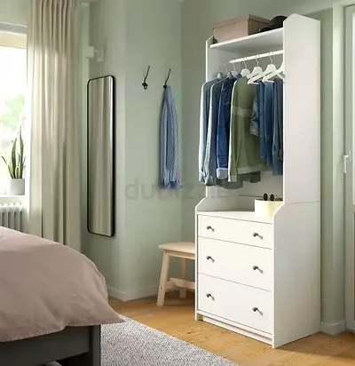 Compact white wardrobe with hanging rail and 3 drawers
