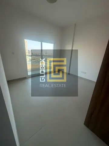 spacious 2-bedroom apartment available for annual rent in Al Ameera Village – Phase 3, offering a peaceful lifestyle in one of Ajman's modern resident