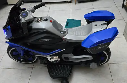 Kids Electric Ride-On Motorbike with Lights and Storage - Good Condition