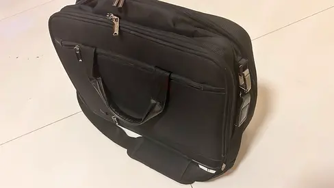 Samsonite - Black laptop briefcase with shoulder strap - good condition - only a year old for sale.