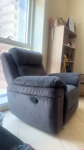 Comfortable grey fabric recliner armchair - good condition