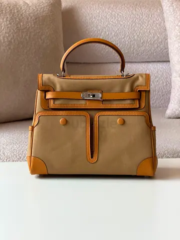 Hermess Beige structured top-handle handbag with tan leather trim