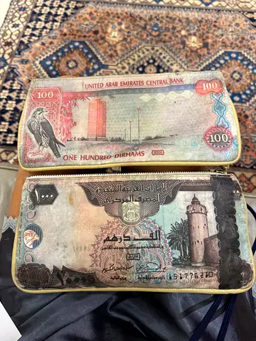 Pair of wallets/ clutches. UAE theme.