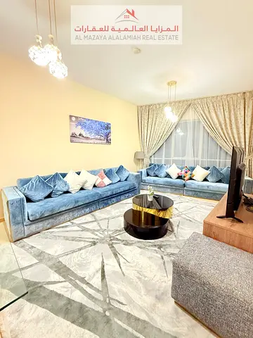 For rent monthly - fully furnished three-bedroom apartment and living room - Sharjah - Al khan - wi
