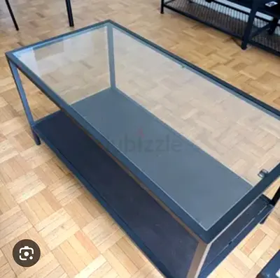 Black Metal Frame Glass Top Coffee Table with Lower Shelf and wheels