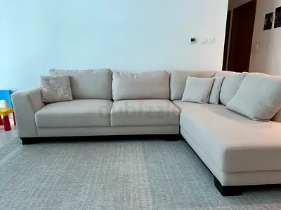 Light grey L-shaped fabric corner sofa, 3-seater with chaise