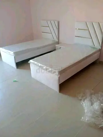 New Pair of single beds with headboards and mattress