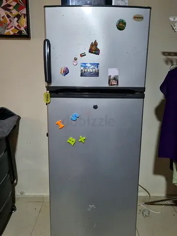 Silver double-door refrigerator - good working condition