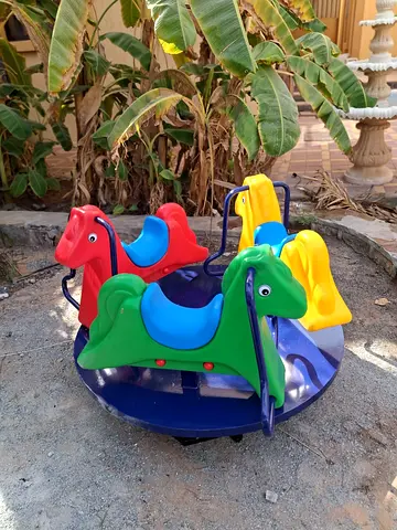 Kids 4-Seat Outdoor Merry-Go-Round Carousel Plastic Ride-On