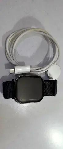 Iphone smartwatch with magnetic charger and extra  free fabric band - good condition.Call now n take
