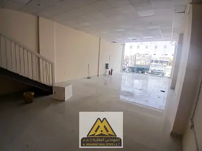 Commercial Shop with Mezzanine | Prime Oman Street Location | Spacious Layout | Ideal for Various Businesses | High Visibility