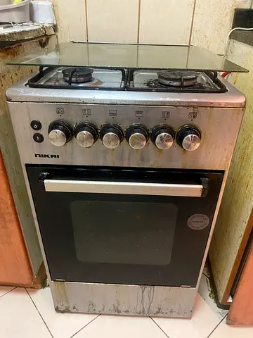 Used freestanding gas oven and 4-burner stove, stainless steel