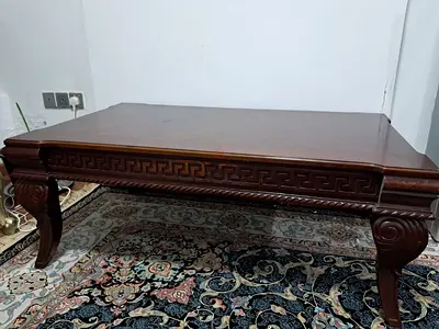 Solid Wood Coffee Table with Carved Legs and Classic Detailing