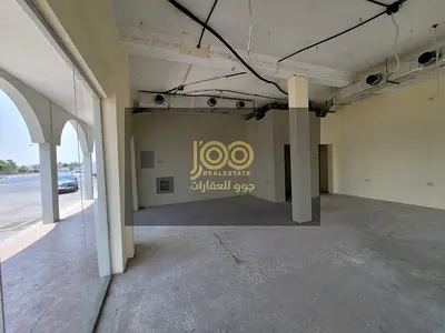 محلان للإيجار في البطين على شارع عام | كونر | 850 قدم² | 30,000 درهم | جميع الأنشطة ماعدا المطاعم