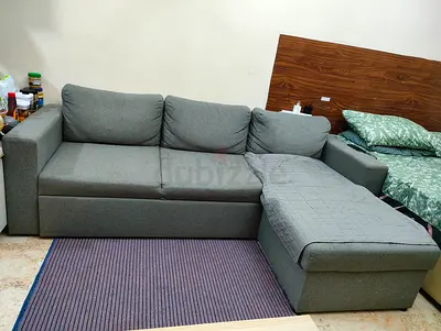 Grey L-shaped Fabric Sofa bed with Chaise - Good Condition