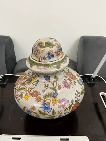 Decorative vintage floral covered ceramic jar / ginger jar
