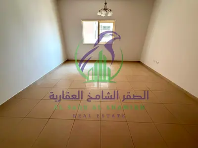 Spacious one-bedroom apartment in Al Majaz 3 with free AC, built-in wardrobes, 2 bathrooms, free parking, maintenance included and prime location