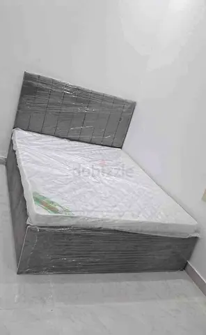 Grey upholstered double bed frame with mattress (new)