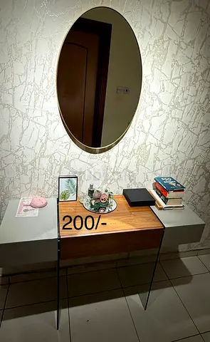Modern glass-legged hallway console table with wooden drawer - 125/-AED