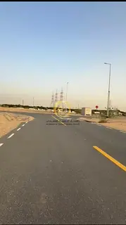 Residential land for sale in the Mazir'ah project – Al Rahmaniyah suburb, Sharjah. Area: 2,800 sq