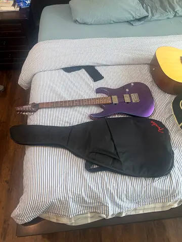 Purple and rainbow electric guitar with fender gig bag - used, playable