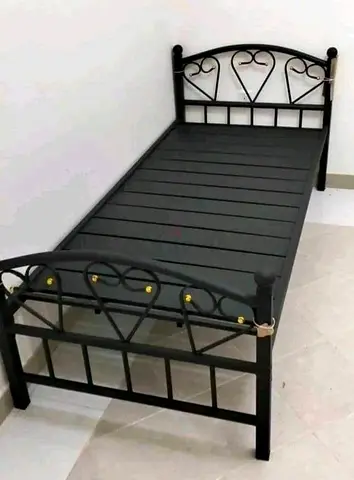 Single metal bed frame with headboard and footboard — black