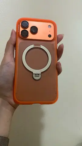 iPhone with orange protective case and ring holder (used)