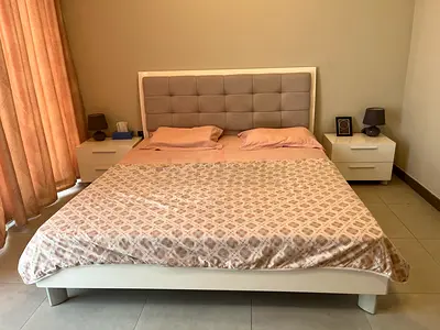 Super King size bed frame two bedside tables and prime support mattress from Home Center