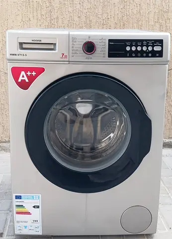 Hoover 7kg front load, color silver, it is working good condition.