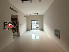 Upgraded 2-bedroom apartment with a living room for annual rent in Al Hamidiya 1 area. New building,