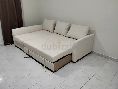 Beige L-shaped Sofa Bed with Storage - Lightly Used