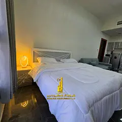 Luxury studio apartment with a semi-detached kitchen, fully furnished, for monthly rent in Ajman - A