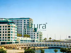 Corner 1BR | Partial Sea View | Beach Access