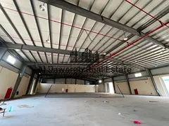 Large warehouse with an enclosed yard available for annual rent in the Emirate of Umm Al Quwain; sui