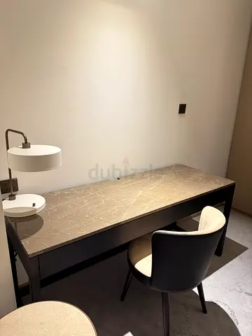 Desk with dark marble top