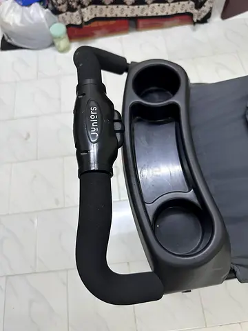 Juniors baby stroller with parent tray and cup holders - good condition
