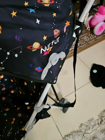 Lightweight umbrella stroller - Nurtur space print, good condition