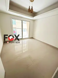 2 bedrooms, living room, and majlis for rent in Al Mowaihat 3, with balcony, gym, and pool. One mont