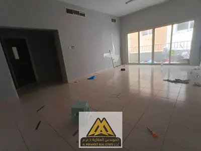 Extra Spacious Layout | Separate Living Room | Balcony | Built-in Wardrobes | Central AC | Free Maintenance | Prime Location Near Al Hikmah School