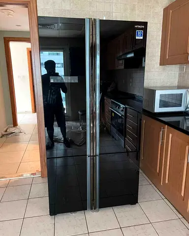 Free delivery Hitachi black glass 4 door refrigerator - good condition