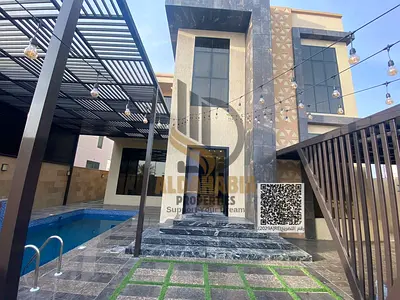فرصة مميزة للإيجار في العالية – عجمان | فيلا مفروشة مع ملحق وحمام سباحة مغطى | 4 غرف ماستر | 3,600 قدم بناء