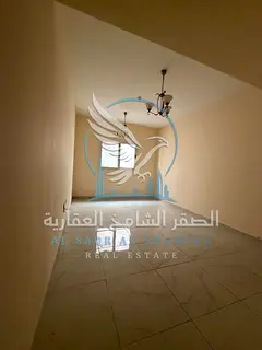 Annual rental: 2-bedroom apartment with living room, open view, spacious areas, built-in wardrobes, 