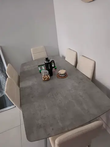 6-Seater Modern Dining Table with Concrete-Style Top and Cream Chairs