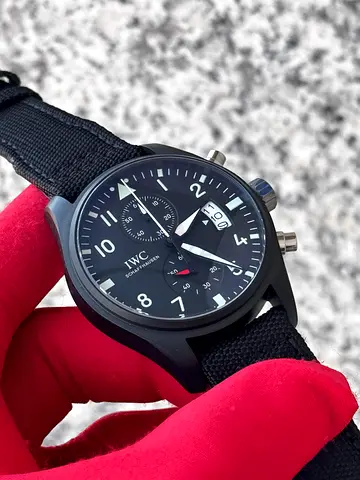 This is an IWC Pilot's Watch Chronograph Top Gun, a luxury timepiece featuring