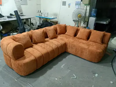 Large L-shaped Orange Fabric Sofa with Cushions